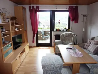 Ein Sitzbereich in der Unterkunft Ferienwohnung Kraemer in Erbach