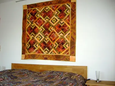 Ein Bett oder Betten in einem Zimmer der Unterkunft Ferienwohnung Ottlinger