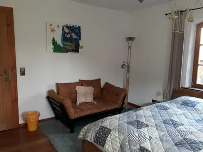 Ein Bett oder Betten in einem Zimmer der Unterkunft Gästezimmer - Fuhrhalterei Maul