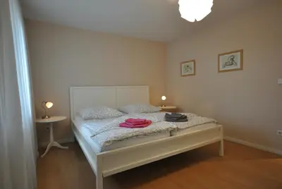 Ein Bett oder Betten in einem Zimmer der Unterkunft Ferienwohnung Guddat