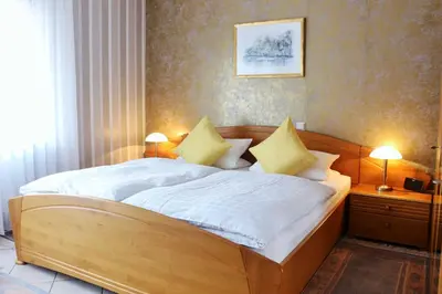 Ein Bett oder Betten in einem Zimmer der Unterkunft Gästehaus Braun