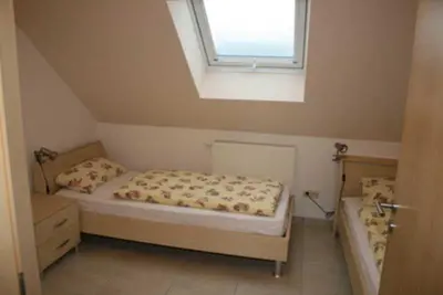 Ein Bett oder Betten in einem Zimmer der Unterkunft Ferienhof Knoll