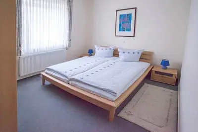 Ein Bett oder Betten in einem Zimmer der Unterkunft Haus Ulla