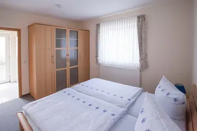 Ein Bett oder Betten in einem Zimmer der Unterkunft Haus Ulla