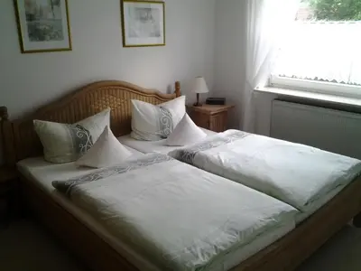 Ein Bett oder Betten in einem Zimmer der Unterkunft Ferienwohnung Christa Hahn