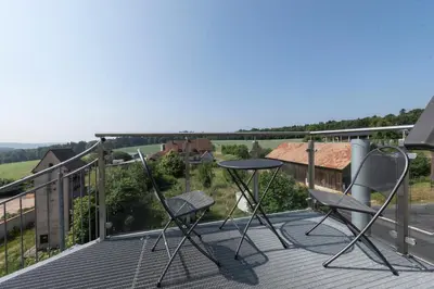 Ein Balkon oder eine Terrasse in der Unterkunft Villa Geisenhof