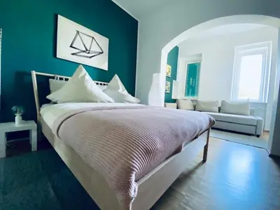 Ein Bett oder Betten in einem Zimmer der Unterkunft Villa Geisenhof