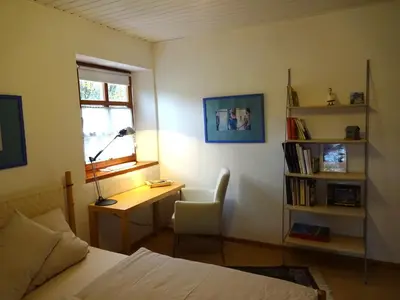 Ein Bett oder Betten in einem Zimmer der Unterkunft Ferienwohnung Am Odenwaldlimes