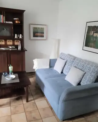 Ein Sitzbereich in der Unterkunft Ferienwohnung Bibert