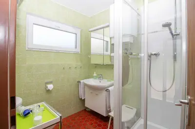 Ein Badezimmer in der Unterkunft Ferienhauser Siefertshof