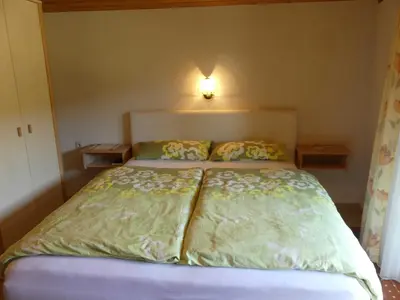 Ein Bett oder Betten in einem Zimmer der Unterkunft Pension Holzerstube