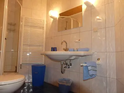 Ein Badezimmer in der Unterkunft Pension Holzerstube