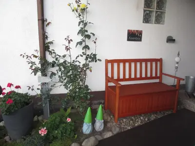 Ein Garten an der Unterkunft Pension Talblick
