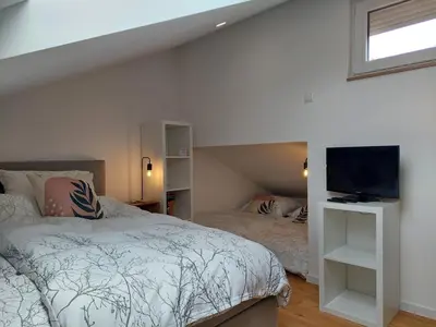 Ein Bett oder Betten in einem Zimmer der Unterkunft Ferienhaus Weinstraße - Pfälzer Wald