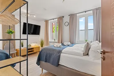 Ein Bett oder Betten in einem Zimmer der Unterkunft WINETIME - Apartment Edenkoben - für bis zu 3 Personen - gemütlich an der südlichen Weinstraße zwischen Landau und Neustadt - nähe Villa Ludwigshöhe - Rietburg