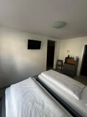 Ein Bett oder Betten in einem Zimmer der Unterkunft Metzgerei Herbst