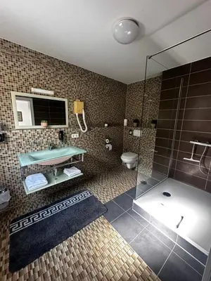 Ein Badezimmer in der Unterkunft Metzgerei Herbst
