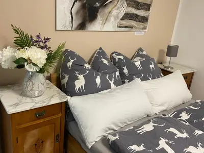 Ein Bett oder Betten in einem Zimmer der Unterkunft Moderne Wohnung umgeben von Weinbergen