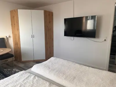 Ein Bett oder Betten in einem Zimmer der Unterkunft Moderne Wohnung umgeben von Weinbergen