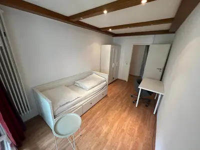 Ein Bett oder Betten in einem Zimmer der Unterkunft Schöne Maisonette 4 Zimmer mit Garten