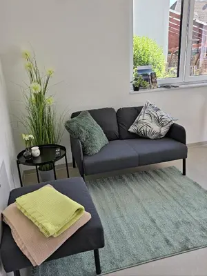 Ein Sitzbereich in der Unterkunft Ferienwohnung Bahr