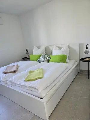 Ein Bett oder Betten in einem Zimmer der Unterkunft Ferienwohnung Bahr