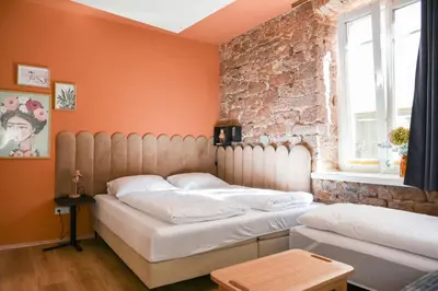 Ein Bett oder Betten in einem Zimmer der Unterkunft LUI Guesthouse - BohoStyle