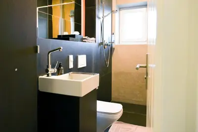Ein Badezimmer in der Unterkunft LUI Guesthouse - BohoStyle