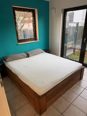 Ein Bett oder Betten in einem Zimmer der Unterkunft Gemütliches Apartment in Erzhausen, südliches Rhein-Main-Gebiet