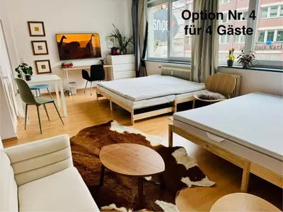 Ein Bett oder Betten in einem Zimmer der Unterkunft UrbanPause Studio KA-Mitte