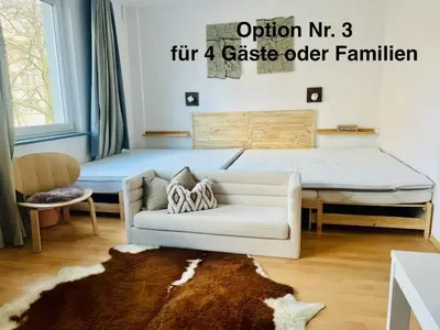 Ein Bett oder Betten in einem Zimmer der Unterkunft UrbanPause Studio KA-Mitte