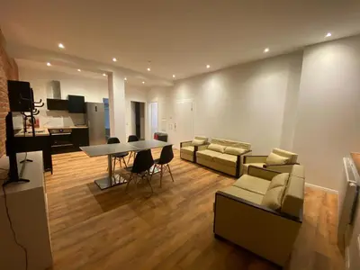 Ein Sitzbereich in der Unterkunft Temporary Home