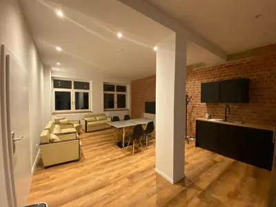 Ein Sitzbereich in der Unterkunft Temporary Home