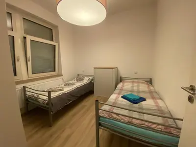Ein Bett oder Betten in einem Zimmer der Unterkunft Temporary Home