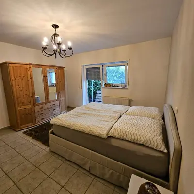 Ein Bett oder Betten in einem Zimmer der Unterkunft Komplette Ferienwohnung für bis zu 4 Personen