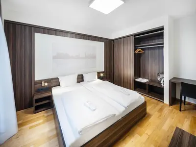 Ein Bett oder Betten in einem Zimmer der Unterkunft sevenDays Hotel BoardingHouse