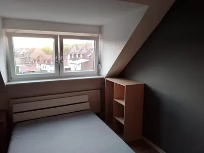 Ein Bett oder Betten in einem Zimmer der Unterkunft 2-Zimmerwohnung in Durlach
