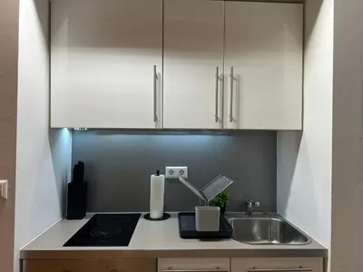 Küche/Küchenzeile in der Unterkunft BELLA - Business&Family Ap 15,100m zum Konzerteingang Schloß, Parkplatz, SmartTV, Netflix, Waschmaschine, 24h Checkin, 30qm