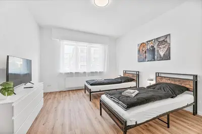 Ein Bett oder Betten in einem Zimmer der Unterkunft PF01 Innenstadt Apartment - NEU Monteurunterkünfte in Pforzheim - LS CrewComfort auch für weitere Unterkünfte