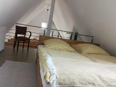 Ein Bett oder Betten in einem Zimmer der Unterkunft Alte Fachwerkresidenz