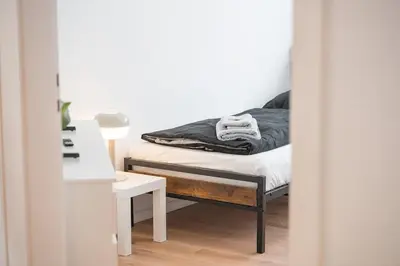 Ein Bett oder Betten in einem Zimmer der Unterkunft PF02 großes Apartment Innenstadt - NEU Monteurunterkünfte in Pforzheim - LS CrewComfort auch für weitere Unterkünfte