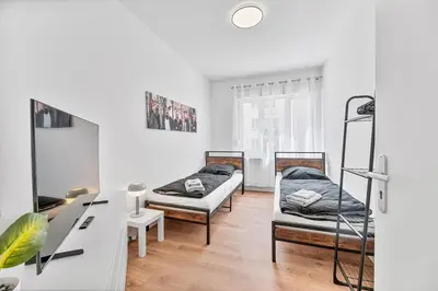 Ein Bett oder Betten in einem Zimmer der Unterkunft PF02 großes Apartment Innenstadt - NEU Monteurunterkünfte in Pforzheim - LS CrewComfort auch für weitere Unterkünfte