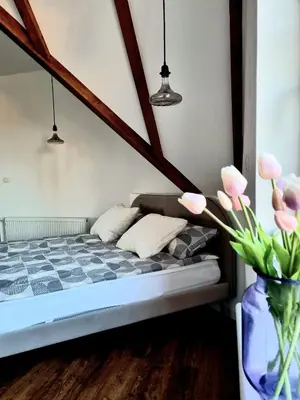 Ein Bett oder Betten in einem Zimmer der Unterkunft Weitblick Pfalz