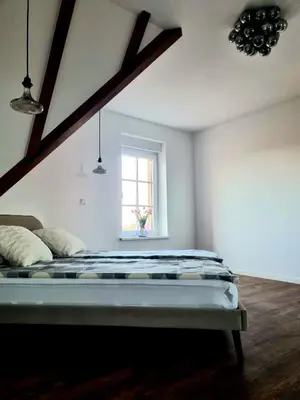 Ein Bett oder Betten in einem Zimmer der Unterkunft Weitblick Pfalz