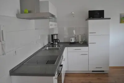 Küche/Küchenzeile in der Unterkunft Ferienhaus Rauwolf mit 2 Ferienwohnungen