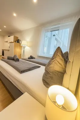 Ein Bett oder Betten in einem Zimmer der Unterkunft Kleines Glück Karlsruhe - Waschmaschine, SBahn, Regendusche, Fußbodenheizung
