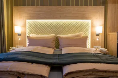 Ein Bett oder Betten in einem Zimmer der Unterkunft Landhotel Zur Post