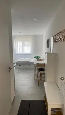 Ein Bett oder Betten in einem Zimmer der Unterkunft Boardinghouse Living