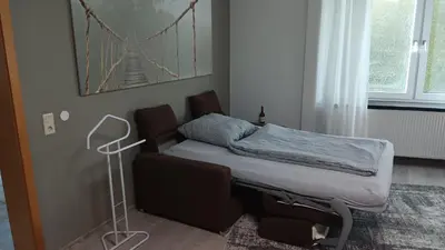 Ein Bett oder Betten in einem Zimmer der Unterkunft FeWo an der Isenach Bad Dürkheim-Hausen