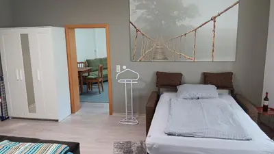 Ein Bett oder Betten in einem Zimmer der Unterkunft FeWo an der Isenach Bad Dürkheim-Hausen